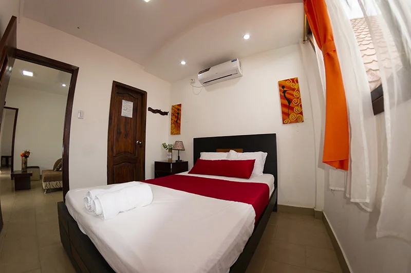 Dormitorio de cabaña quíntuple de tres ambientes en Hostería Oceanic con vistas panorámicas